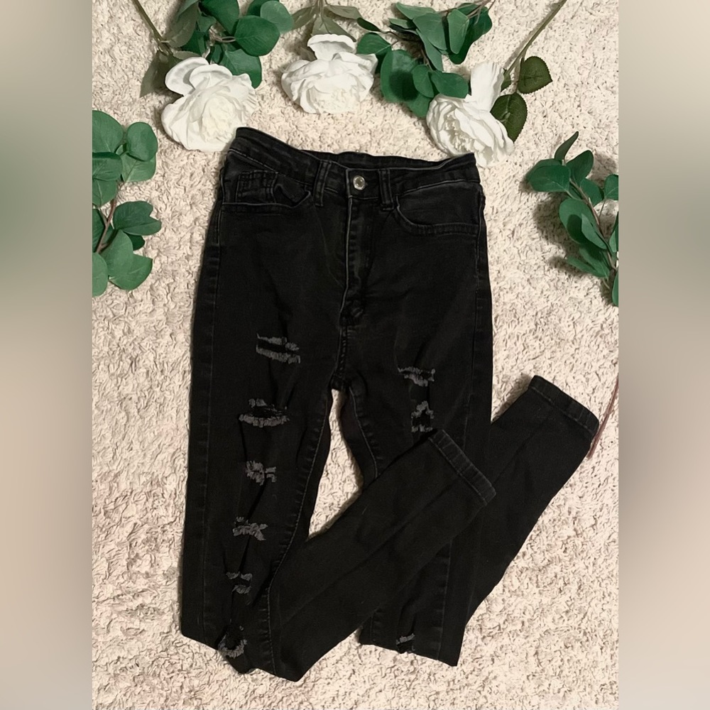 Black ripped jeans, never worn